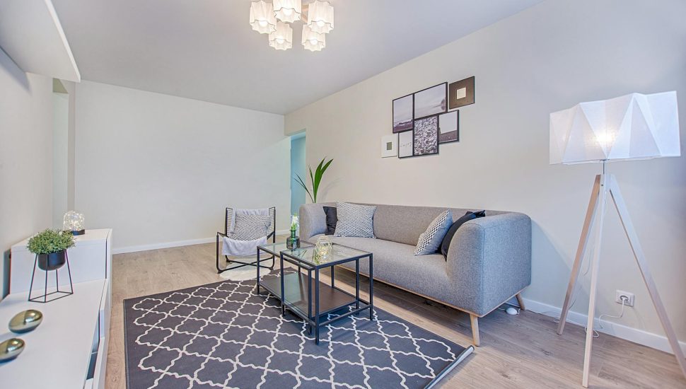 gray fabric sofa placed indoor