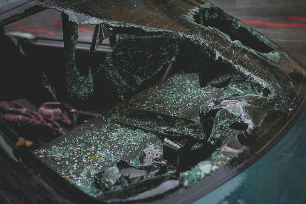 a broken windshield of a car