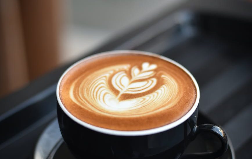 close up of coffee cup on table