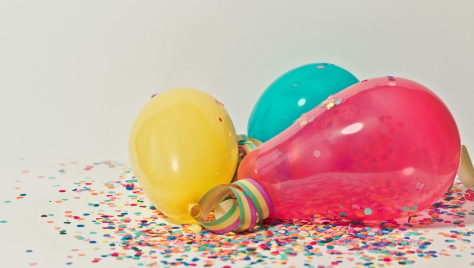 colorful balloons with confetti