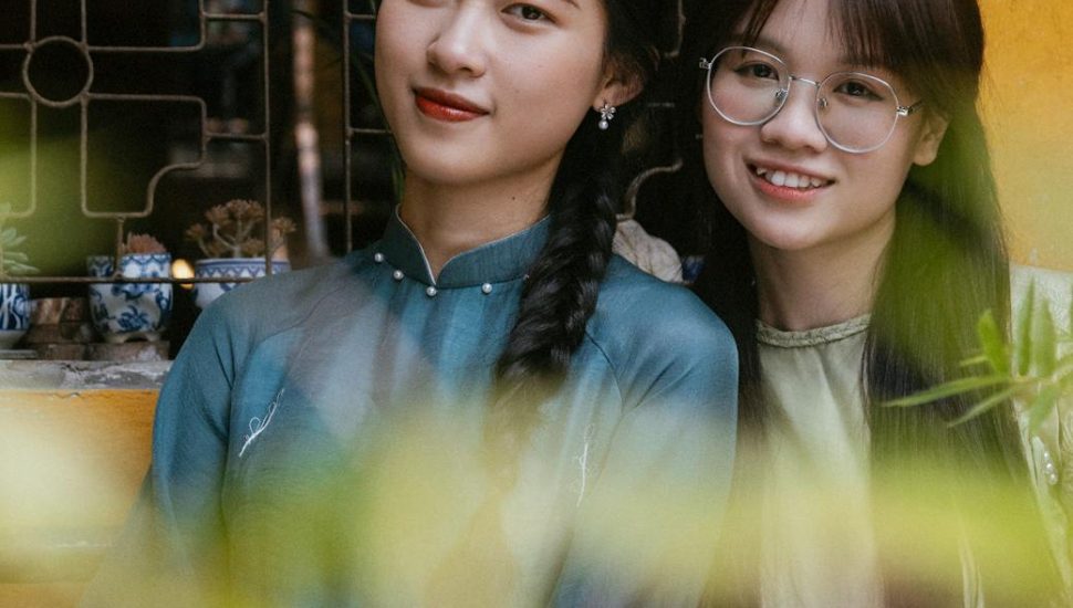 portrait of two women in elegant traditional attire