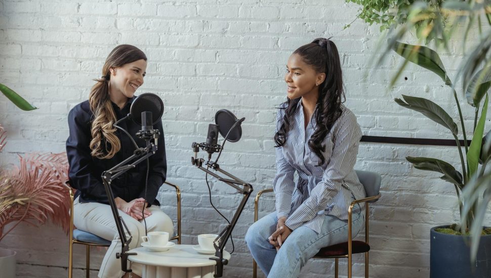 multiethnic women talking in broadcasting studio
