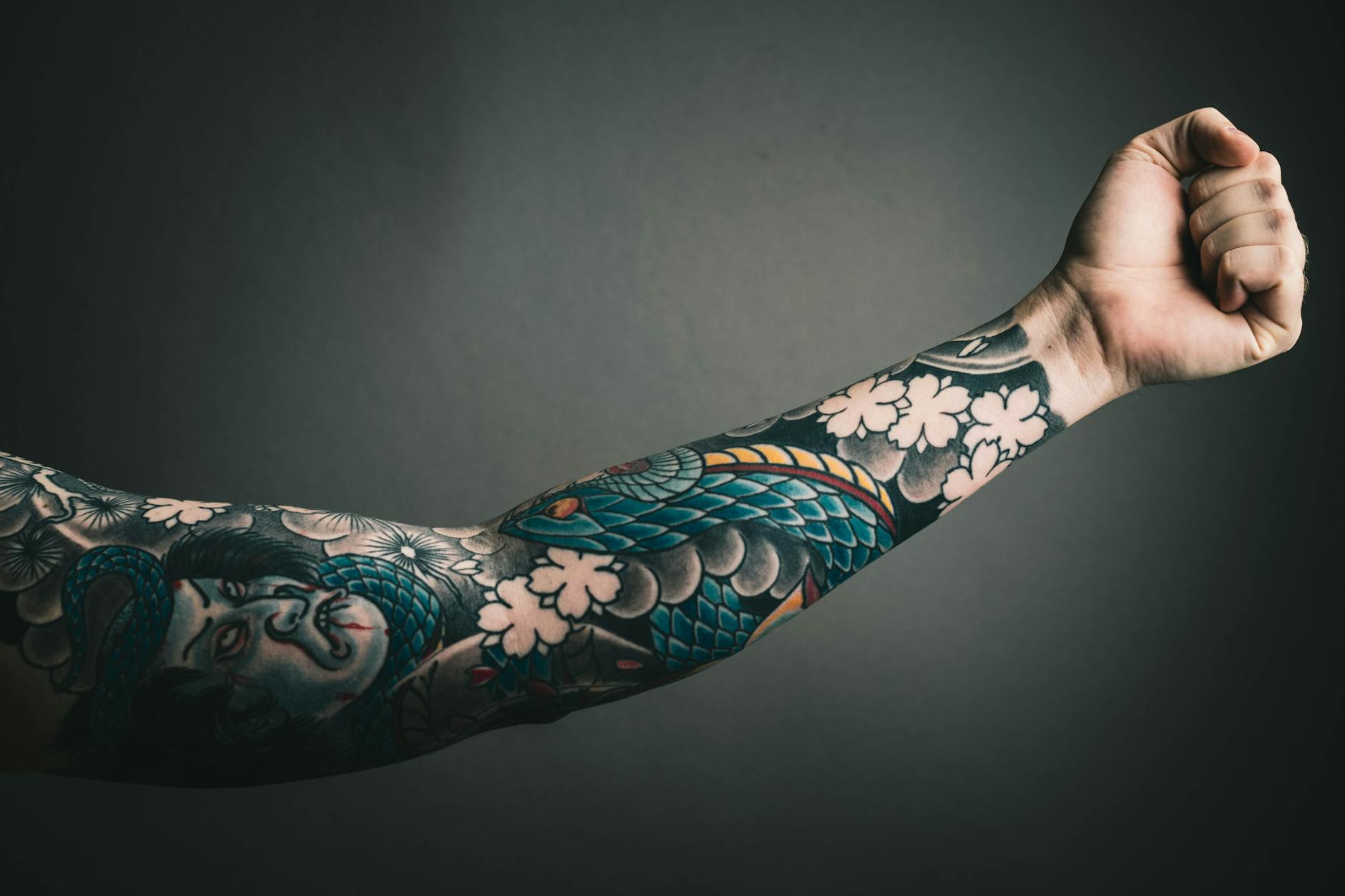 photo of left arm with tattoo