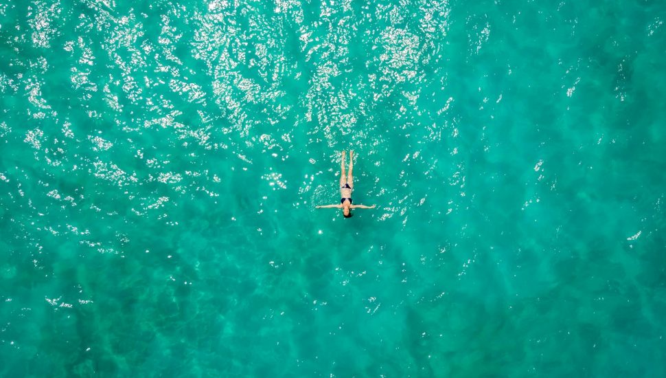 aerial view of person in body of water